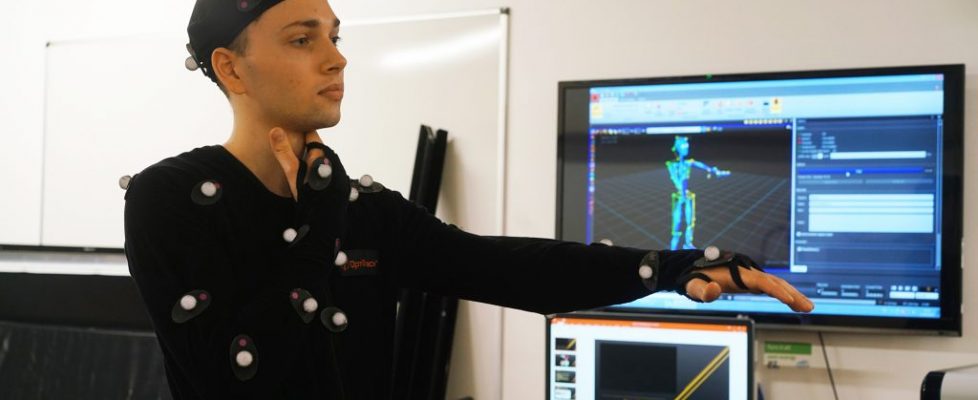 Motion capture of the performance sequence at the XRLab at the University of Westminster. Here, Piotr wearing a motion capture suit. Photo by Danmei Luo